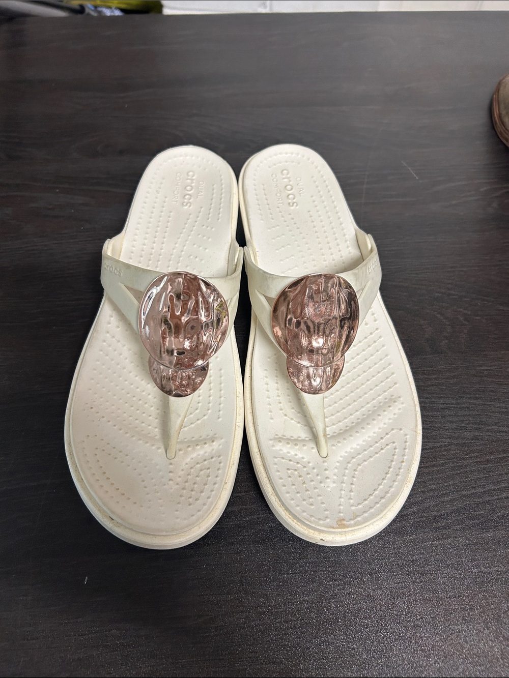 CROCS Women’s White Flip Sandals with Rose Gold Accent